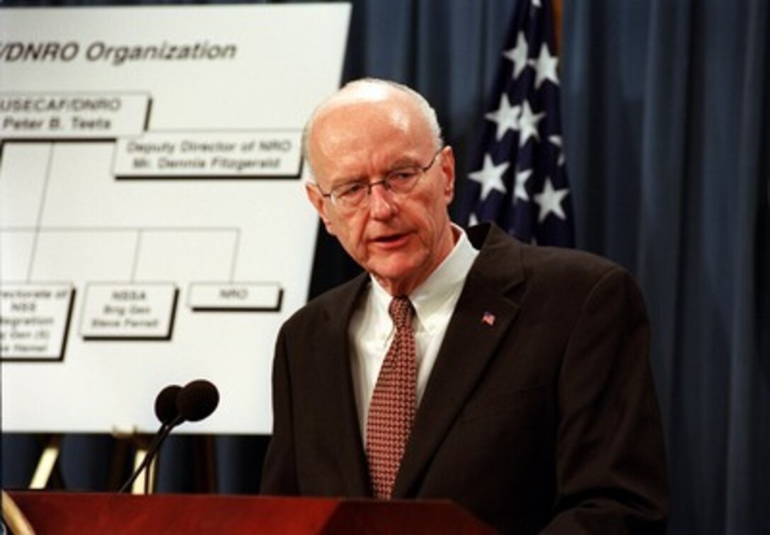 Under Secretary of the Air Force and Director of the National Reconnaissance Office Peter B. Teets conducts a Pentagon press briefing on Feb. 7, 2002, concerning the implementation of the Space Commission's recommendations on space transformation. 