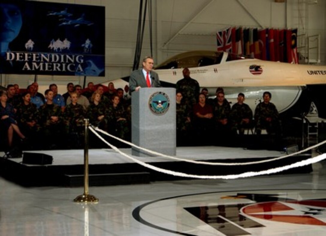 Secretary of Defense Donald H. Rumsfeld responds to a question during a town hall meeting at Nellis Air Force Base, Nev., on Feb. 20, 2002. Rumsfeld is visiting Nellis to meet the troops and the local commanders stationed there. 