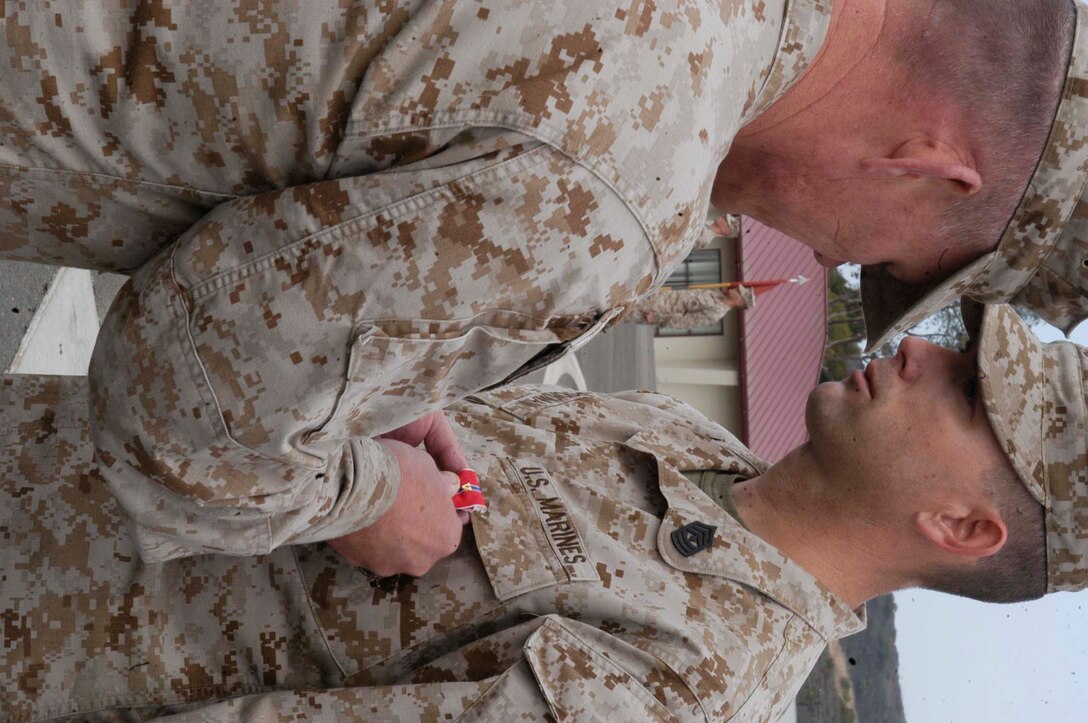 First Sgt. Michael D. Brookman, Company 1st Sgt., Company C, 1st Battalion, 5th Marine Regiment, 1st Marine Division, was awarded the Bronze Star Medal Friday from Col. Larry D. Nicholson, Regimential Commanding Officer, 5th Marine Regiment.