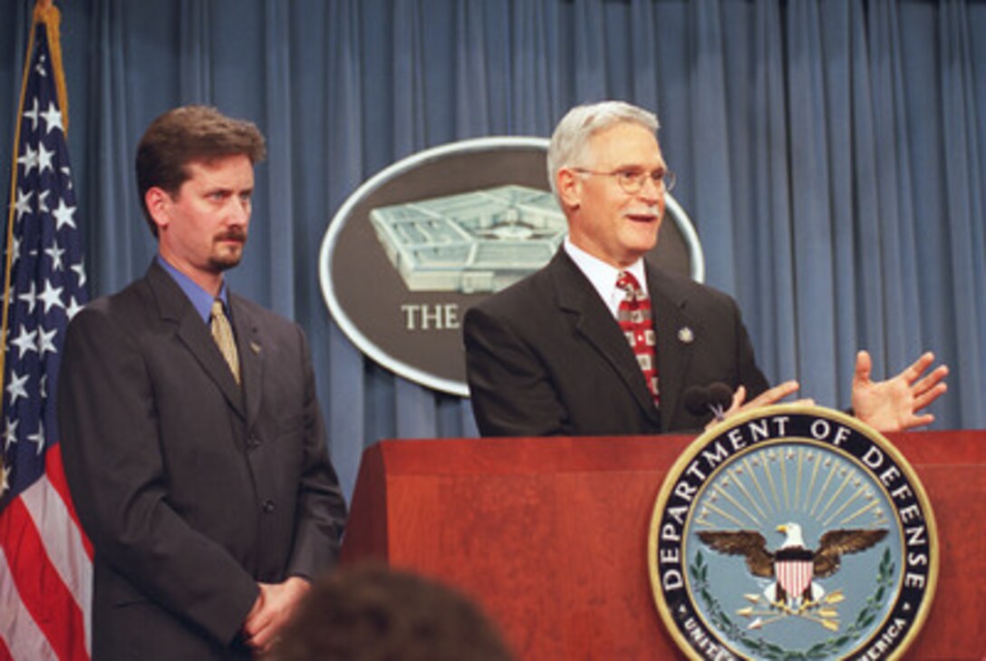 Jeff David (left), deputy director of the Technical Support Working Group, and John Reingruber (right), assistant for science and technology, office of the Deputy Assistant Secretary of Defense for Combating Terrorism, participate in a Pentagon press briefing on Nov. 29, 2001. The Technical Support Working Group is a Department of Defense organization having the mission to identify, prioritize and coordinate interagency and international research and development requirements for combating terrorism. 