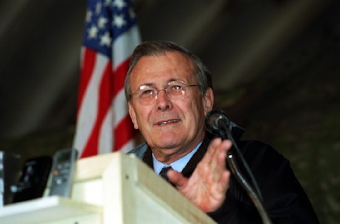 Secretary of Defense Donald H. Rumsfeld addresses soldiers of the Army's 10th Mountain Division and U.S. Air Force personnel on Dec. 16, 2001. The troops are deployed to central Asia for Operation Enduring Freedom. 