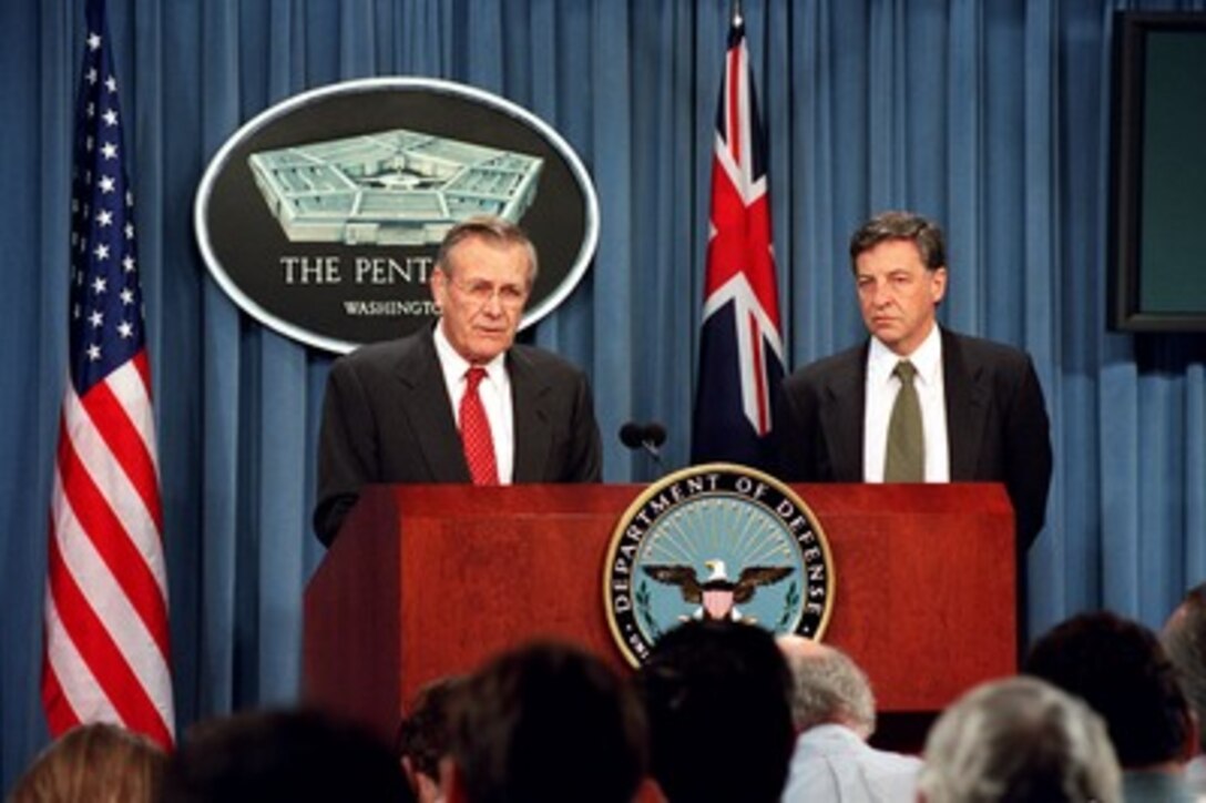 Secretary of Defense Donald H. Rumsfeld and Australian Minister of Defense Robert M. Hill conduct a joint press briefing in the Pentagon on Jan. 10, 2002. The two leaders met earlier to discuss defense issues of mutual interest. 