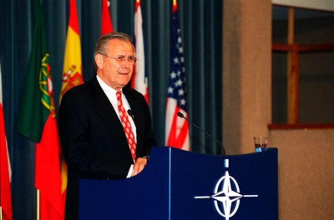 Secretary of Defense Donald H. Rumsfeld conducts a press briefing following NATO meetings and bilateral meetings with his French and Russian counterparts at NATO headquarters in Brussels, Belgium, on June 6, 2002. Rumsfeld is on a 10-day tour of nine countries to meet with senior leaders and to visit with U.S. troops deployed abroad. 
