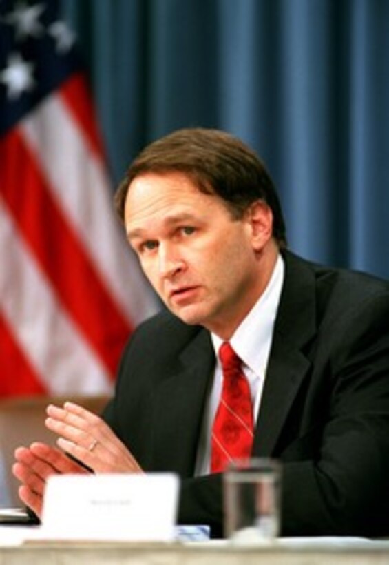 Assistant Secretary of Defense for Health Affairs Dr. William Winkenwerder Jr. announces the resumption of the Department of Defense anthrax immunization program during a June 28, 2002, Pentagon press briefing. 