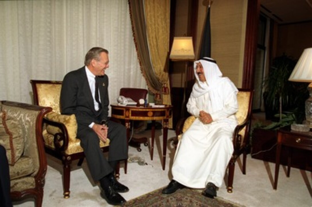 Secretary of Defense Donald H. Rumsfeld meets with First Deputy Prime Minister and Foreign Minister Shaykh Sabah al-Ahmad al-Sabah at the Ministry of Foreign Affairs in Kuwait on June 9, 2002. Rumsfeld is on a 10-day tour of nine countries to meet with senior leaders and to visit with U.S. troops deployed abroad. 