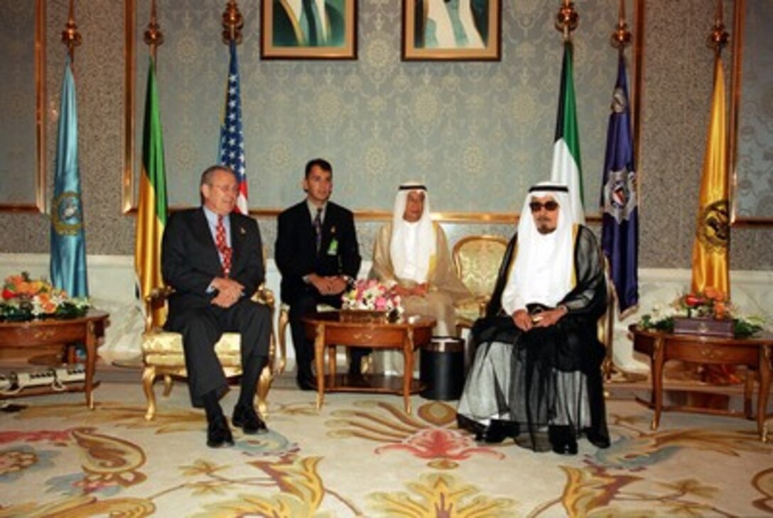 Secretary of Defense Donald H. Rumsfeld meets with Amir Jabir al-Ahmad al-Jabir Al Sabah at the Bayan Palace Conference Center in Kuwait on June 10, 2002. Rumsfeld is on a 10-day tour of nine countries to meet with senior leaders and to visit with U.S. troops deployed abroad. 