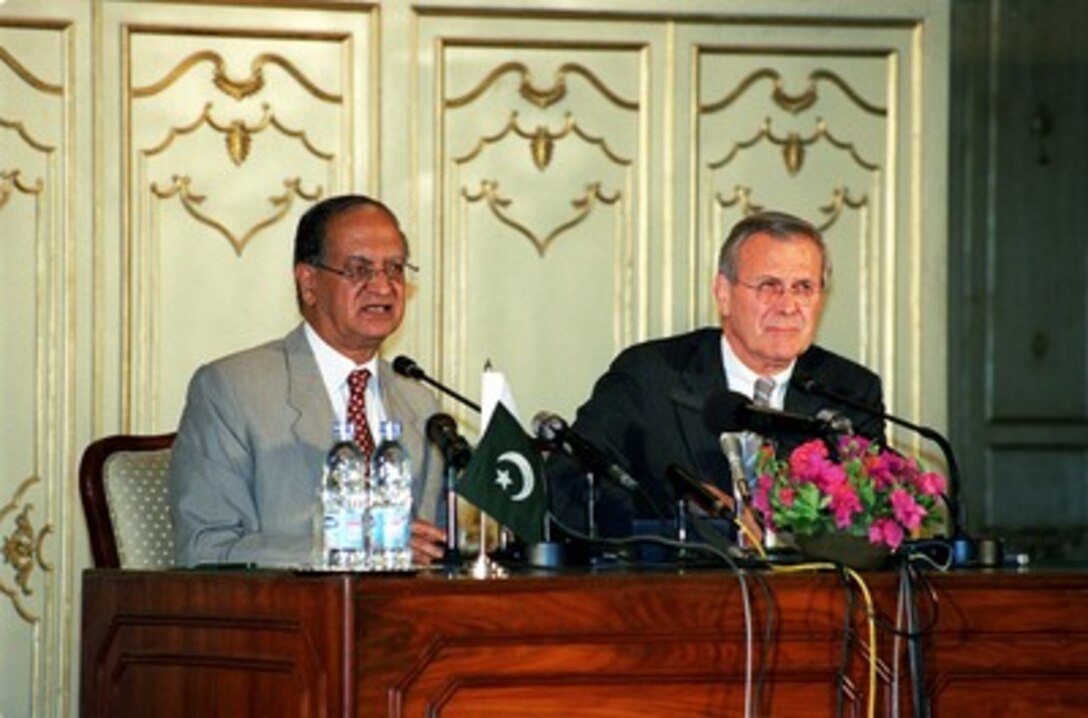 Indian Minister of Foreign Affairs Abdul Satter (left) makes his opening statement during a joint press conference with Secretary of Defense Donald H. Rumsfeld at the Ministry of Foreign Affairs in Islamabad, Pakistan, on June 13, 2002. Rumsfeld is on a 10-day tour of nine countries to meet with senior leaders and to visit with U.S. troops deployed abroad. 