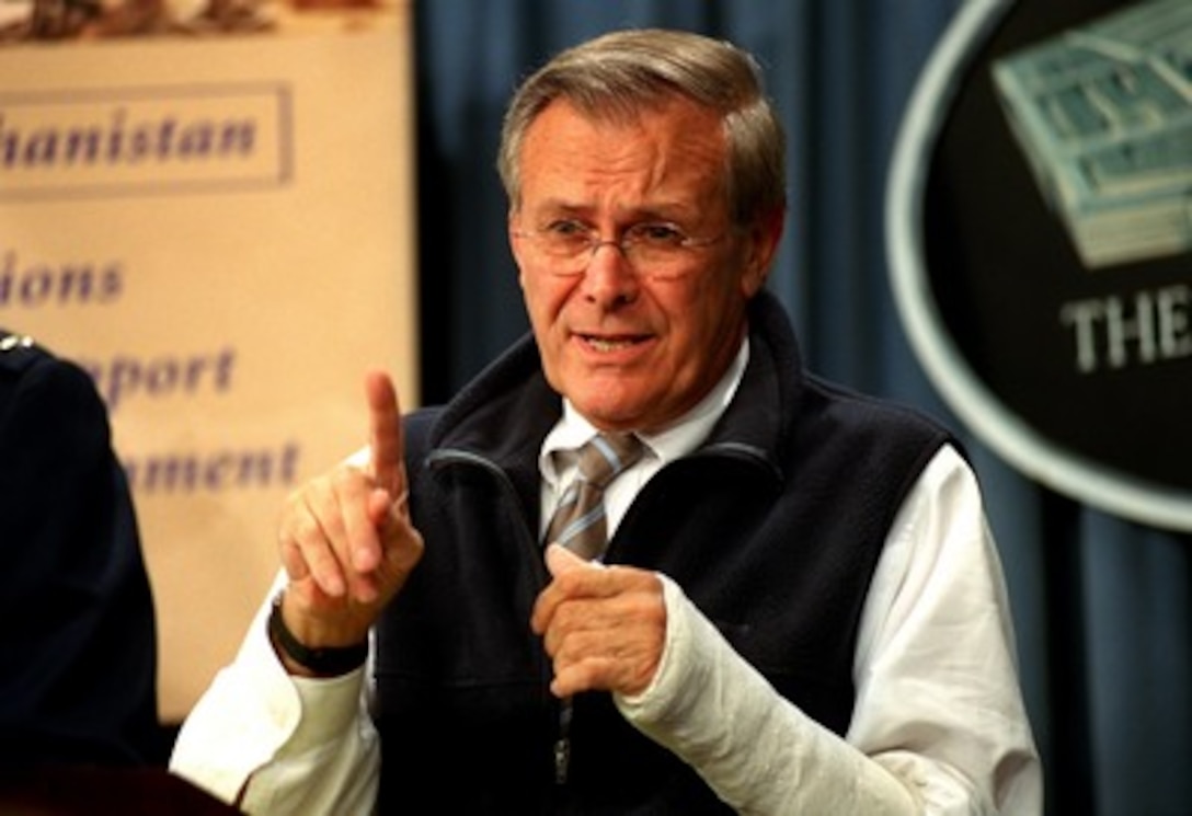 Secretary of Defense Donald H. Rumsfeld emphasizes a point as he answers a reporter's question during a Pentagon press conference on July 22, 2002. Rumsfeld and Chairman of the Joint Chiefs of Staff Gen. Richard B. Myers, U.S. Air Force, reviewed the accomplishments of the coalition in the war against terrorism during the past nine months in Afghanistan. Rumsfeld's left forearm is in a cast following recent surgery to repair an arthritic thumb. 