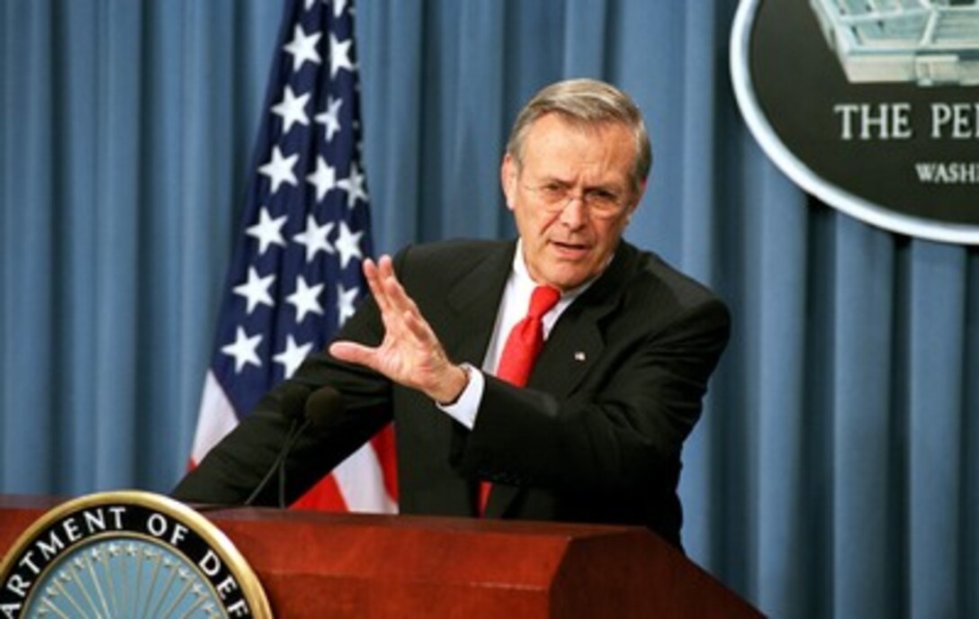 Secretary of Defense Donald H. Rumsfeld answers a reporter's question after announcing the cancellation of the Crusader Artillery System during a Pentagon press briefing on May 8, 2002. Rumsfeld also took questions on the progress of Operation Enduring Freedom. 