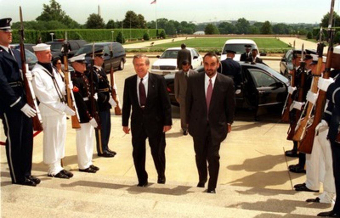 Secretary of Defense Donald H. Rumsfeld (left) escorts United Arab Emirates Armed Forces Chief of Staff Lt. Gen. Mohammad bin Zayid Al Nuhayyan into the Pentagon on May 16, 2002. The two defense leaders and their staffs will discuss bilateral security issues including the war on terrorism. 