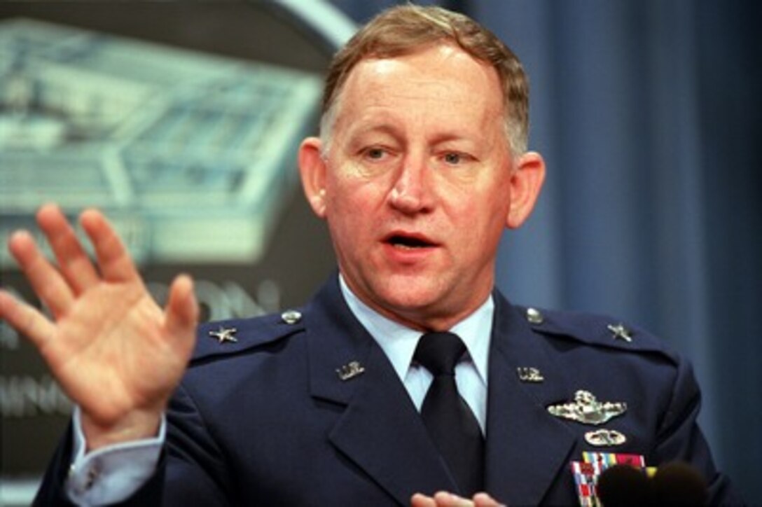 Brig. Gen. James Smith, U.S. Air Force, briefs reporters in the Pentagon on Millennium Challenge 2002 on May 22, 2002. Millennium Challenge 2002 is a three-week training exercise/experiment to test the effectiveness of a number of transformational technologies, involving hardware, software and conceptual doctrines, which have been developed over the past two years. More than 13,500 military and civilian personnel will participate in the event which will be conducted at 26 different locations in the United States making it the largest joint military experiment of it's kind in history. Smith is the deputy commander, U.S. Forces Command's Joint Warfighting Center. 