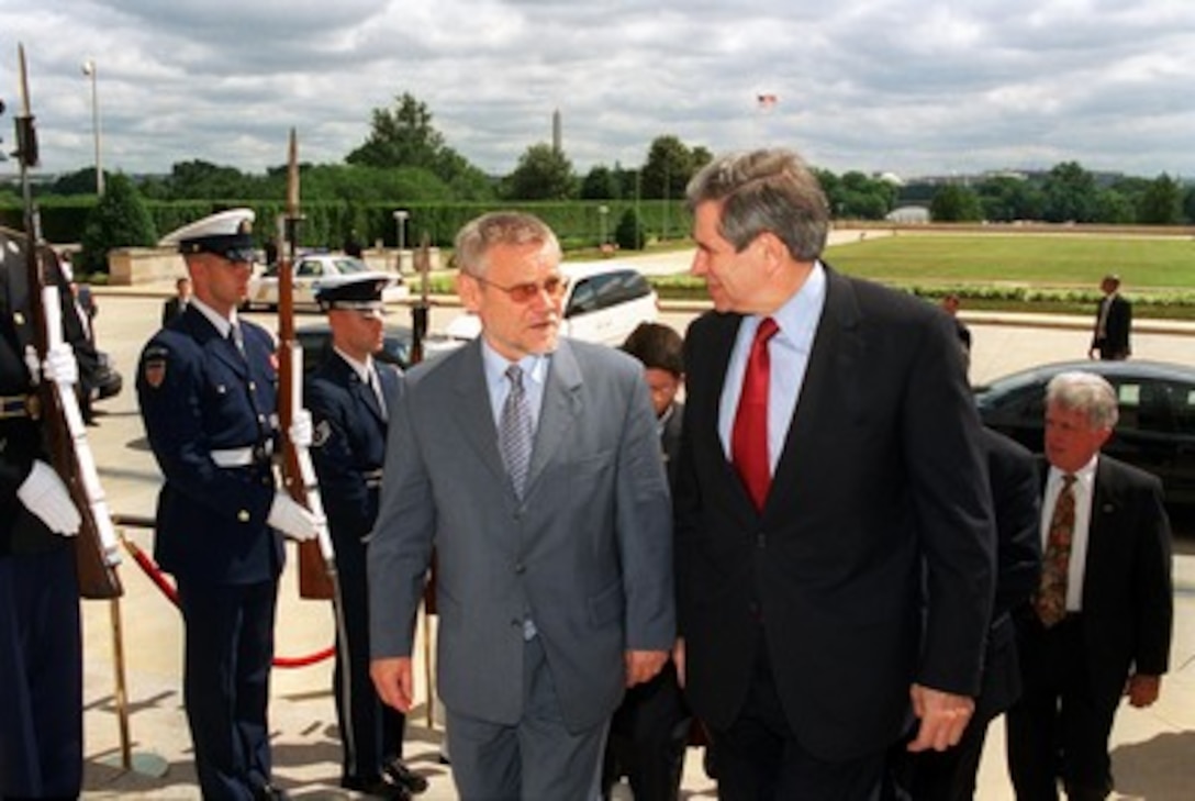 Croatian Prime Minister Ivica Racan (left) arrives at the Pentagon on June 7, 2002, for a meeting with Deputy Secretary of Defense Paul Wolfowitz. Racan and Wolfowitz will meet to discuss a range of bilateral security issues. 