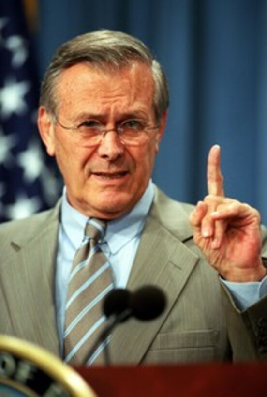 Secretary of Defense Donald H. Rumsfeld briefs reporters at the Pentagon about his trip to Europe, the Persian Gulf, India and Pakistan, during a June 17, 2002, press briefing. 