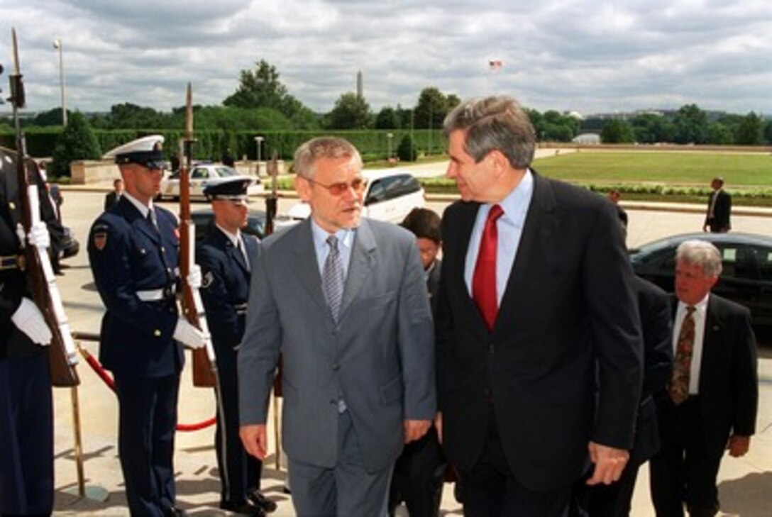Croatian Prime Minister Ivica Racan (left) arrives at the Pentagon on June 7, 2002, for a meeting with Deputy Secretary of Defense Paul Wolfowitz. Racan and Wolfowitz will meet to discuss a range of bilateral security issues. 