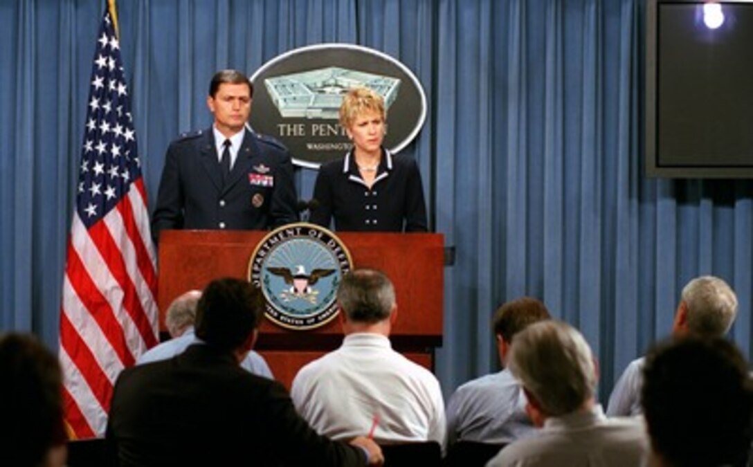 Assistant Secretary of Defense for Public Affairs Victoria Clarke and Air Force Brig. Gen. John W. Rosa Jr. conduct a Pentagon press briefing on June 25, 2002. Rosa, who is the deputy director for current operations on the Joint Staff, updated reporters on Operation Mountain Lion in Afghanistan. 