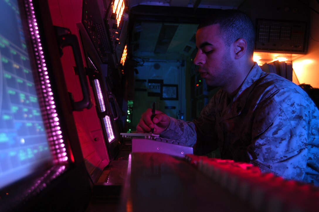 AL TAQADDUM, Iraq (April 2, 2005) - Each day air traffic controllers like Cpl. Marques J. Johnson, a native of Bowie Md., control the movement of thousands of tons of cargo and hundreds of lives. The Marines of MACS-2 work throughout the Al Anbar province of Iraq providing air traffic control services.