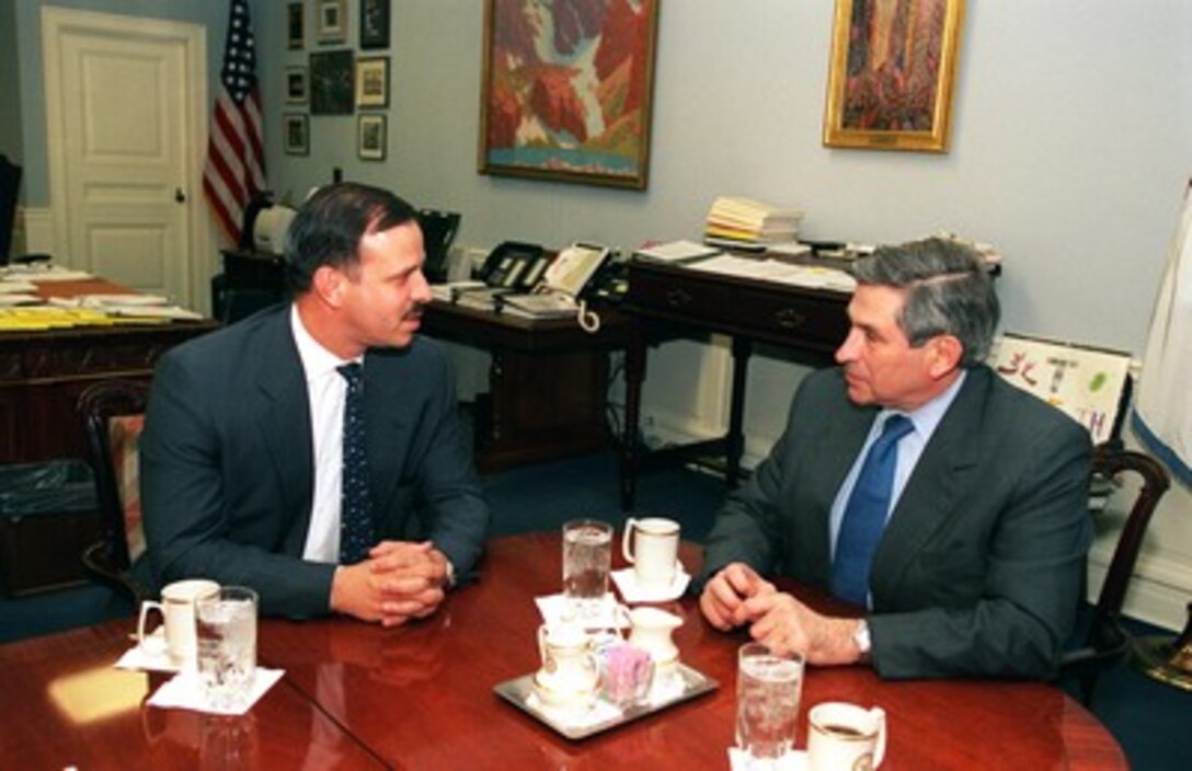 Deputy Secretary of Defense Paul Wolfowitz (right) meets with His Royal Highness Prince Faisan bin Hussein al Hashimi (left) of Jordan in the Pentagon on March 7, 2002. Prince Faisal, who is also a major general and deputy commander of the Royal Jordanian Air Force, is meeting with Wolfowitz to discuss defense issues of mutual interest. 