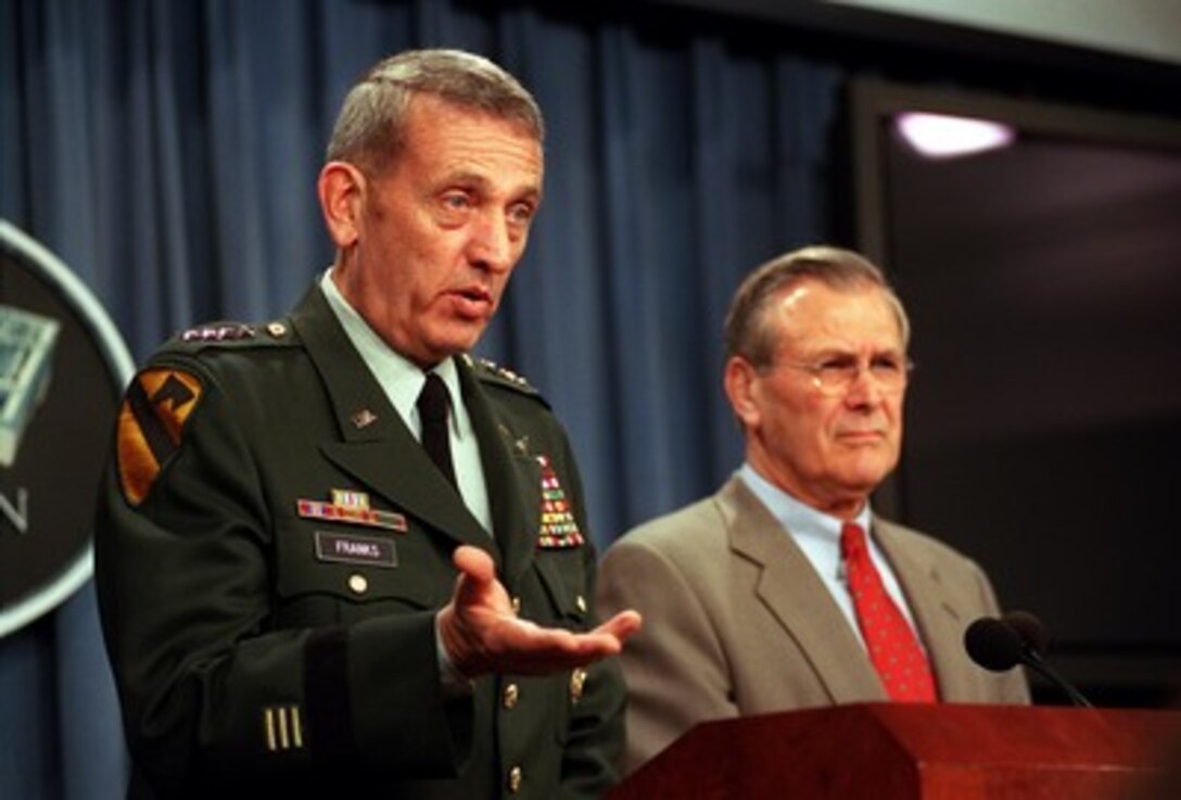 Gen. Tommy R. Franks, U.S. Army, commander in chief, U.S. Central Command, and Secretary of Defense Donald H. Rumsfeld brief reporters in the Pentagon on March 6, 2002. Franks and Rumsfeld are updating the media on the progress of Operation Anaconda, a large combat operation involving U.S. and coalition forces underway in the Shahikot Mountains of eastern Afghanistan, near the city of Gardez. 