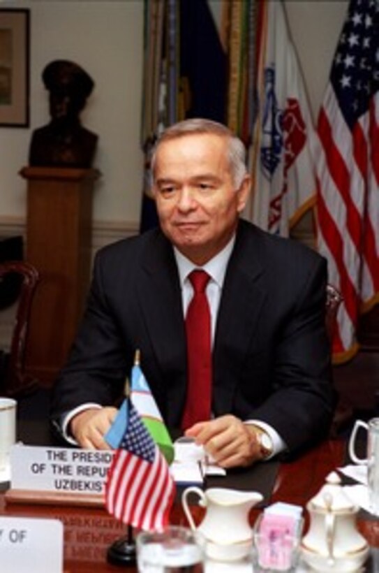 Uzbekistan President Islom Karimov meets with Secretary of Defense Donald H. Rumsfeld in the Pentagon on March 13, 2002. Karimov and Rumsfeld are meeting to discuss the war on terrorism and regional security issues. 
