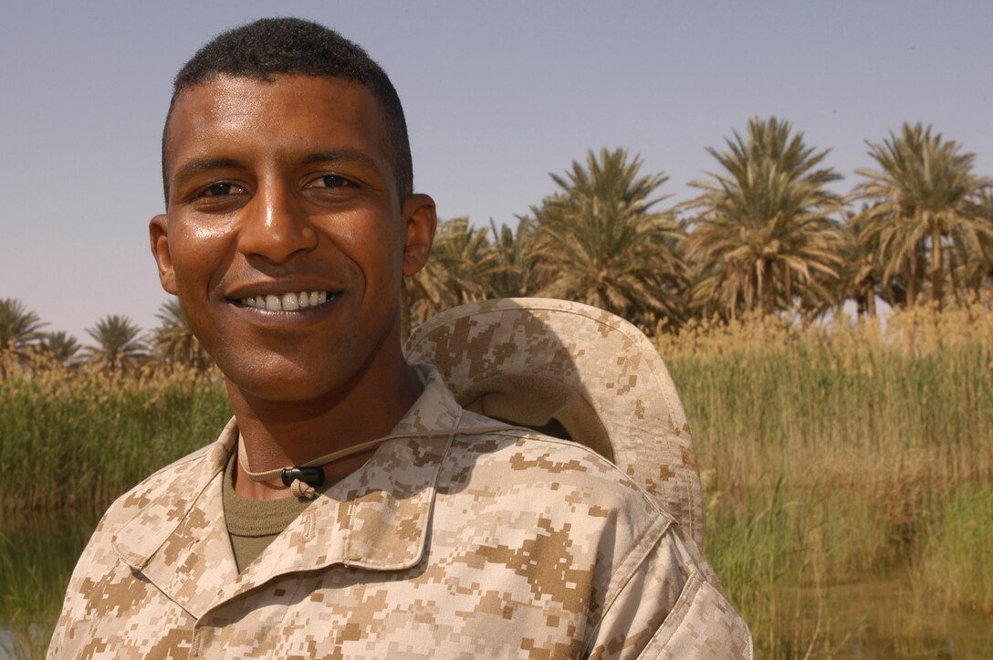 AL ASAD, Iraq (April 14, 2005) - Serving as translator for the Marine and civilian law enforcement instructors at the Regional Iraqi Police and Border Patrol Academy here, Chris, as his coworkers call him, has overcome years of trials and tribulations to be at the point he is today. Fleeing the persecution of his homeland, he then struggled under the oppressive regime of Saddam Hussein for a decade before seeking refuge in Jordan. Now he has returned to help ensure the freedom of the Iraqi people.