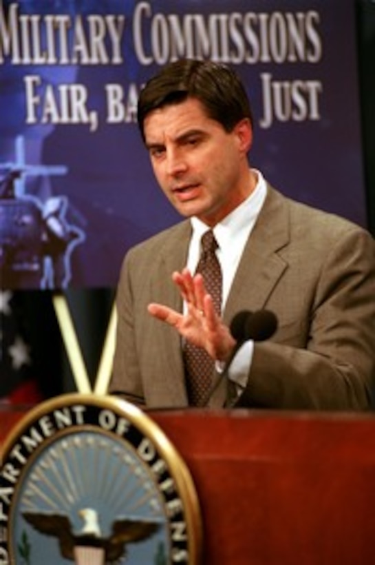 Department of Defense General Counsel William Haynes briefs reporters at the Pentagon on March 21, 2002, about some of the procedural rules that will guide the military commissions in the trials of detainees from the war on terrorism. 