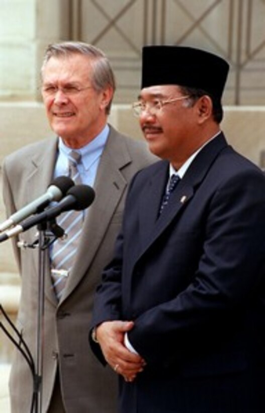 Secretary of Defense Donald H. Rumsfeld (left) and Indonesian Minister of Defense Matori Abdul Djalil (right) conduct a joint media availability outside the Pentagon on May 13, 2002. The two defense leaders met earlier to discuss a range of bilateral security issues including the war on terrorism. 