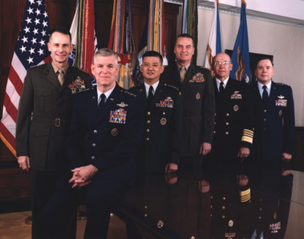 The Joint Chiefs of Staff photographed in the Joint Chiefs of Staff Gold Room, more commonly known as The Tank, in the Pentagon on December 14, 2001. From left to right are: Vice Chairman of the Joint Chiefs of Staff Gen. Peter Pace, U.S. Marine Corps, Chairman of the Joint Chiefs of Staff Gen. Richard B. Myers, U.S. Air Force, U.S. Army Chief of Staff Gen. Eric K. Shinseki, U.S. Marine Corps Commandant Gen. James L. Jones Jr., U.S. Navy Chief of Naval Operations Adm. Vern E. Clark, U.S. Air Force Chief of Staff Gen. John P. Jumper. 