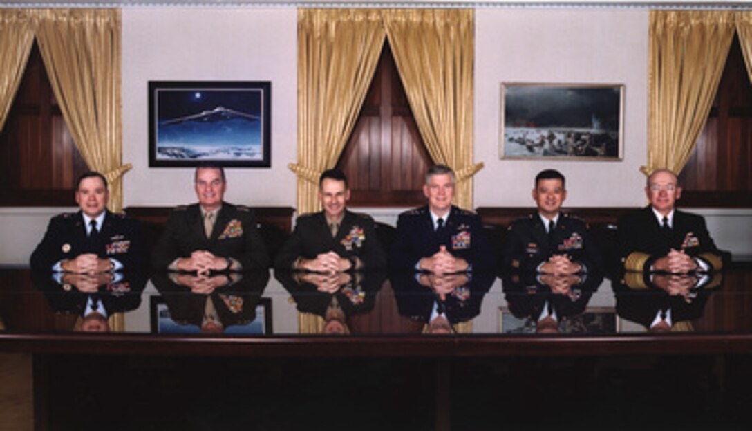 The Joint Chiefs of Staff photographed in the Joint Chiefs of Staff Gold Room, more commonly known as The Tank, in the Pentagon on December 14, 2001. From left to right are: U.S. Air Force Chief of Staff Gen. John P. Jumper, U.S. Marine Corps Commandant Gen. James L. Jones Jr., Vice Chairman of the Joint Chiefs of Staff Gen. Peter Pace, U.S. Marine Corps, Chairman of the Joint Chiefs of Staff Gen. Richard B. Myers, U.S. Air Force, U.S. Army Chief of Staff Gen. Eric K. Shinseki, U.S. Navy Chief of Naval Operations Adm. Vern E. Clark. 