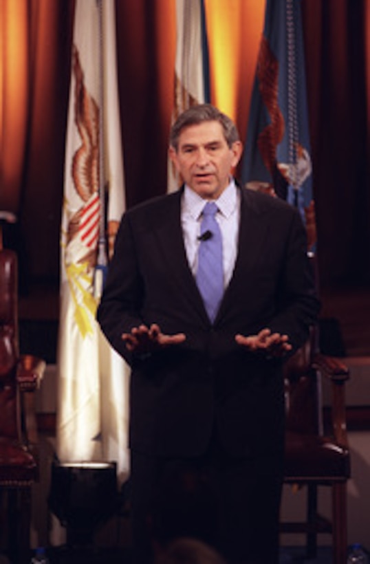 Deputy Secretary of Defense Paul Wolfowitz responds to a question during a Pentagon Town Hall meeting on Nov. 12, 2002. Secretary of Defense Donald H. Rumsfeld hosted the meeting to answer questions from military members and civilian employees of the Department of Defense. 