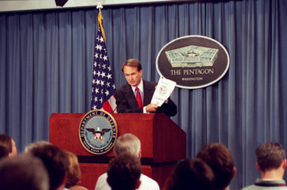 Assistant Secretary of Defense (Health Affairs) Dr. William Winkenwerder Jr., holds a Pentagon news conference on Oct. 9, 2002, to release 28 detailed fact sheets on 27 Cold War-era chemical and biological warfare tests identified as Project 112. 