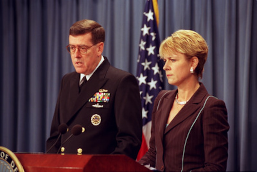 Rear Adm. David A. Gove, deputy director for global operations, J-3, responds to a reporter's question during a Pentagon press briefing with Assistant Secretary of Defense for Public Affairs Victoria Clarke on Oct. 11, 2002. 