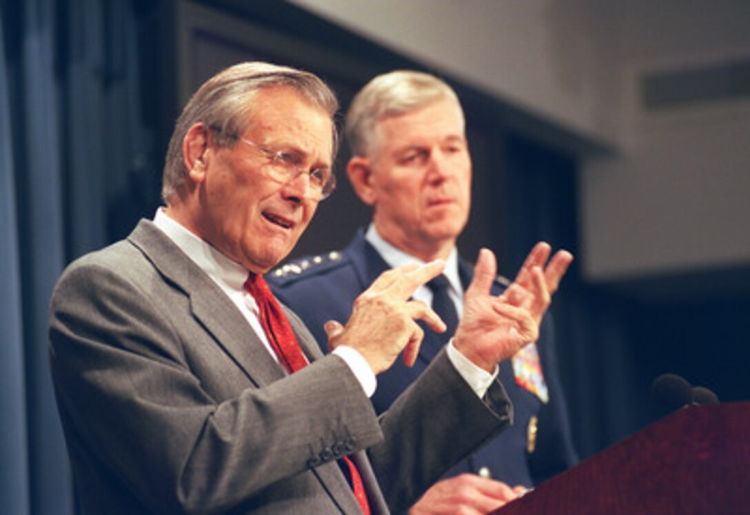 Secretary of Defense Donald H. Rumsfeld conducts a joint press briefing with Chairman of the Joint Chiefs of Staff Gen. Richard B. Myers, U.S. Air Force, in the Pentagon on Oct. 24, 2002. Rumsfeld talked about the excellent relationship between the Central Intelligence Agency (CIA) and the Department of Defense. He said that the cooperation was particularly effective at the Central Command level in Afghanistan where our troops work side-by-side with CIA personnel in fighting terrorism. 