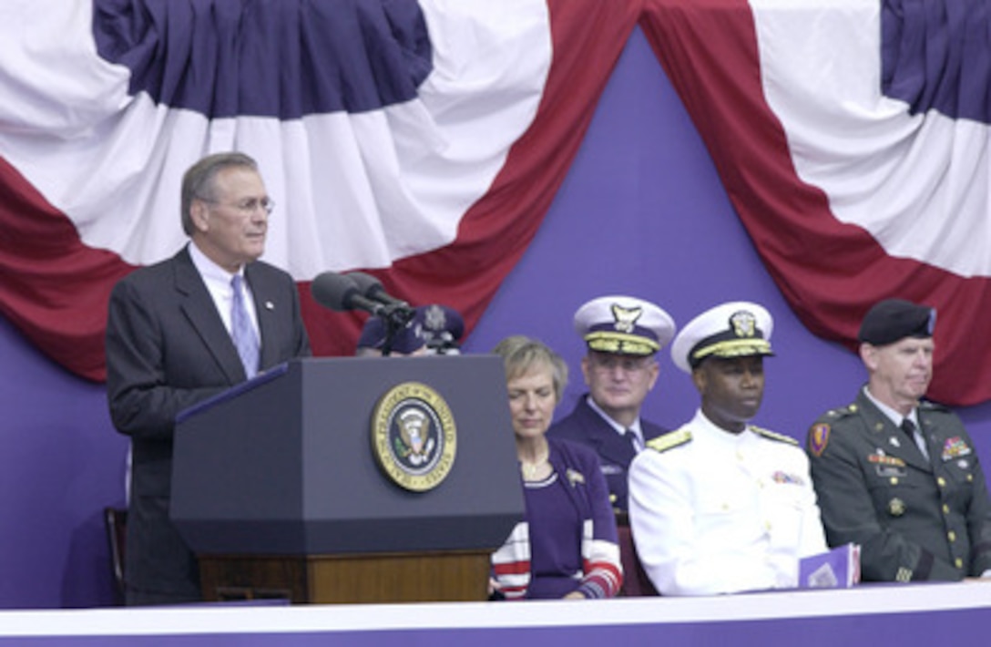 Secretary of Defense Donald H. Rumsfeld speaks during the Sept. 11 Observance Ceremony at the Pentagon. More than 13,000 people attended the service to remember those who lost their lives one year ago when terrorists crashed a commercial airliner into the Pentagon. 