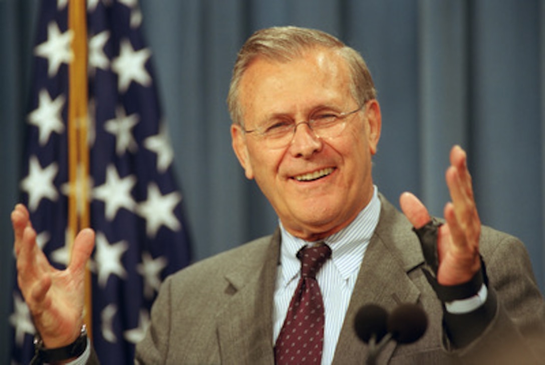 Secretary of Defense Donald H. Rumsfeld responds to a reporter's question during the Sept. 3, 2002, Pentagon press briefing. Rumsfeld and Gen. Richard Myers, chairman of the Joint Chiefs of Staff, briefed reporters on events in Afghanistan and the war on terrorism. 