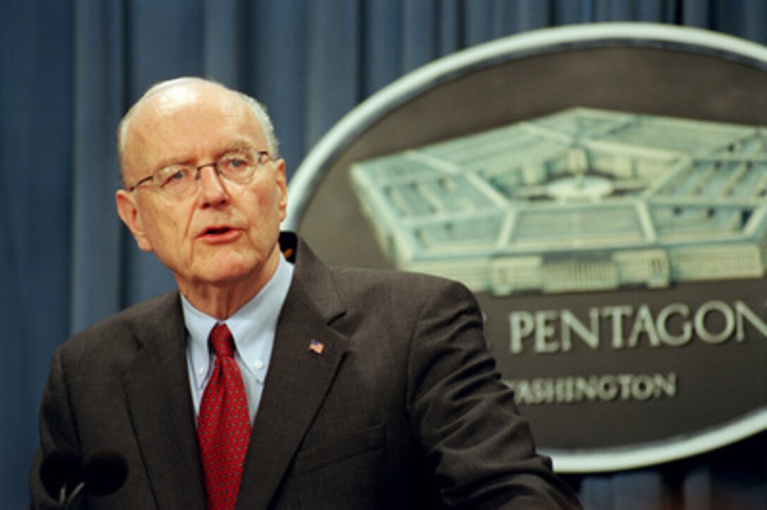 Under Secretary of the Air Force Peter Teets briefs Pentagon reporters on Sept. 3, 2002, about the opening of the Transformational Communications Office. The mission of the office is to ensure communications compatibility across the Department of Defense, the intelligence community and NASA. 