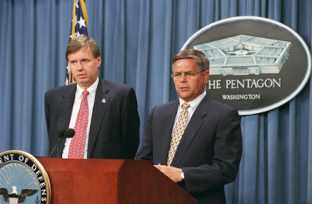 Federal Trade Commission Chairman Timothy J. Muris (left) and Assistant Secretary of Defense Charles S. Abell conduct a joint press briefing in the Pentagon on Sept. 24, 2002, to announce the establishment of Military Sentinel, a new consumer complaint database for the military community. 