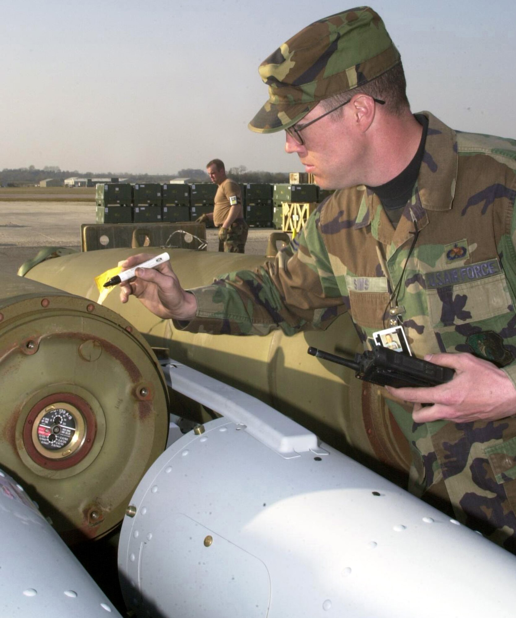 OPERATION IRAQI FREEDOM -- Master Sgt. Stephen Sims gives each bomb a number to track the weapons produced and expended. Sims is the production supervisor, or "pad dad," for the munitions flight at a forward-deployed location supporting Operation Iraqi Freedom. (U.S. Air Force photo by Staff Sgt. Kristina Barrett)