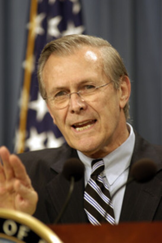 Secretary of Defense Donald H. Rumsfeld answers a reporter's question during a Pentagon press conference on April 3, 2003. Rumsfeld told reporters how coalition forces have taken key bridges over the Tigris and Euphrates Rivers easing the approach to Baghdad. Rumsfeld and Chairman of the Joint Chiefs of Staff Gen. Richard B. Myers, U.S. Air Force, provided reporters with an update on Operation Iraqi Freedom, which is the multinational coalition effort to liberate the Iraqi people, eliminate Iraq's weapons of mass destruction and end the regime of Saddam Hussein. 