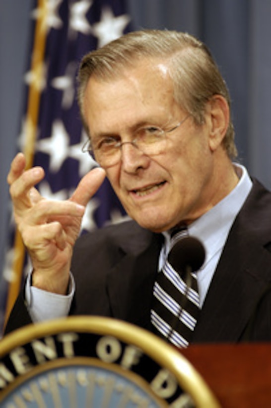 Secretary of Defense Donald H. Rumsfeld answers a reporter's question during a Pentagon press conference on April 3, 2003. Rumsfeld told reporters how coalition forces have taken key bridges over the Tigris and Euphrates Rivers easing the approach to Baghdad. Rumsfeld and Chairman of the Joint Chiefs of Staff Gen. Richard B. Myers, U.S. Air Force, provided reporters with an update on Operation Iraqi Freedom, which is the multinational coalition effort to liberate the Iraqi people, eliminate Iraq's weapons of mass destruction and end the regime of Saddam Hussein. 