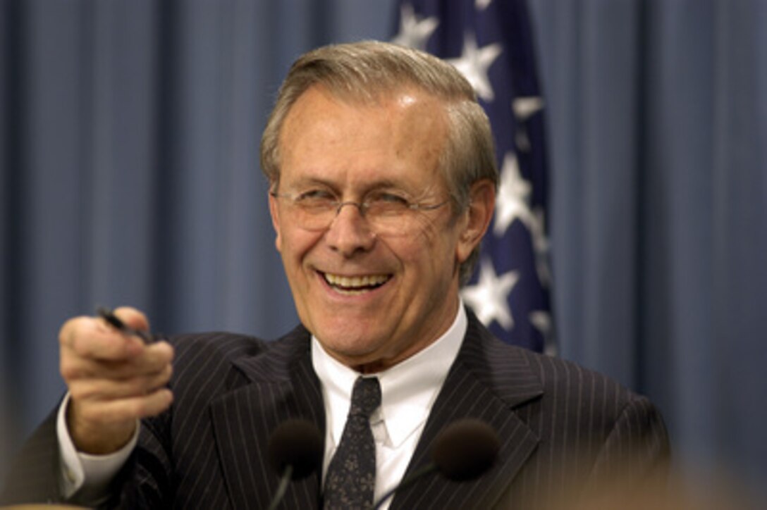Secretary of Defense Donald H. Rumsfeld calls on a reporter during a Pentagon press conference on April 9, 2003. Rumsfeld and Chairman of the Joint Chiefs of Staff Gen. Richard B. Myers, U.S. Air Force, briefed reporters on the progress of Operation Iraqi Freedom, which is the multinational coalition effort to liberate the Iraqi people, eliminate Iraq's weapons of mass destruction and end the regime of Saddam Hussein. 