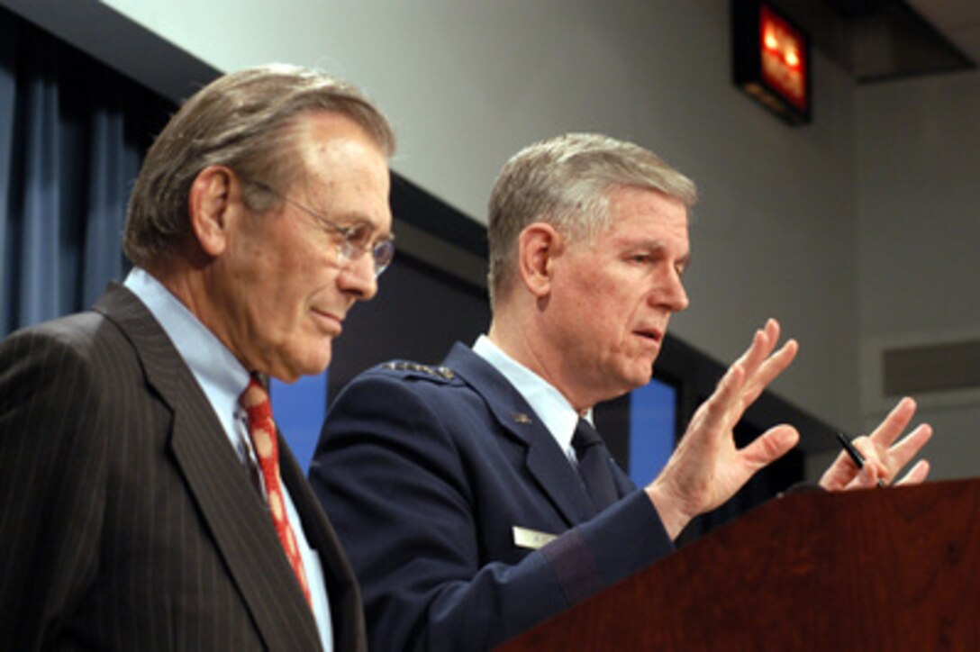 Chairman of the Joint Chiefs of Staff Gen. Richard B. Myers, U.S. Air Force, responds to a reporter's question during a Pentagon press conference on April 11, 2003, with Secretary of Defense Donald H. Rumsfeld. Myers and Rumsfeld briefed reporters on the progress of Operation Iraqi Freedom, which is the multinational coalition effort to liberate the Iraqi people, eliminate Iraq's weapons of mass destruction and end the regime of Saddam Hussein. 