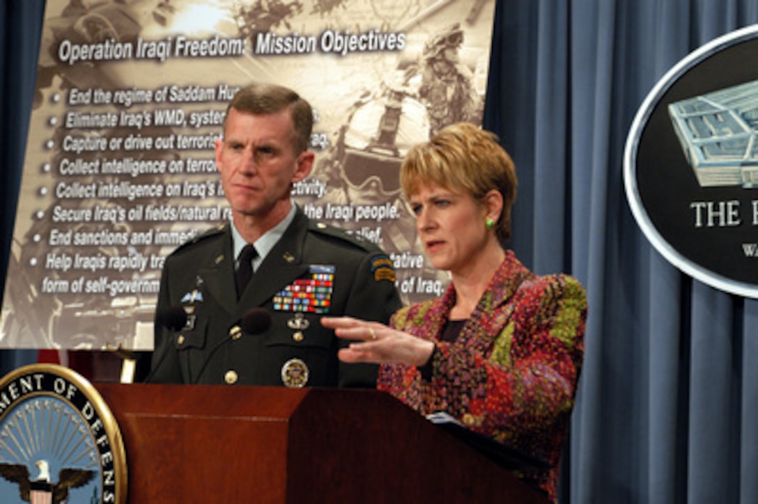 Assistant Secretary of Defense for Public Affairs Victoria Clarke reminds reporters of the eight Operation Iraqi Freedom mission objectives during a Pentagon press conference with Maj. Gen. Stanley A. McChrystal, U.S. Army, on April 14, 2003. Operation Iraqi Freedom is the multinational coalition effort to liberate the Iraqi people, eliminate Iraq's weapons of mass destruction and end the regime of Saddam Hussein. McChrystal is the vice director for Operations, J-3, the Joint Staff. 