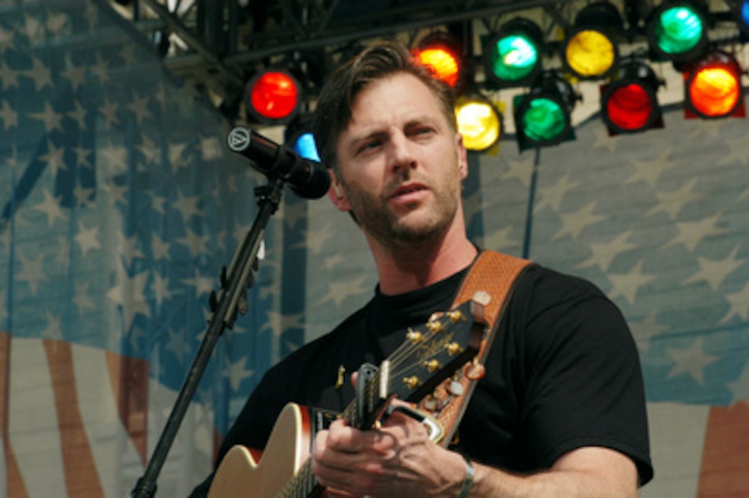 Nashville singer/songwriter Darryl Worley sings during a concert in the center courtyard of the Pentagon on April 16, 2003. One of the songs Worley sang for the military and DoD employee audience at the Pentagon and around the world on American Forces Radio and Television was his hit single "Have You Forgotten." Worley wrote the song after traveling with the United Service Organizations to entertain troops in Afghanistan last December. 