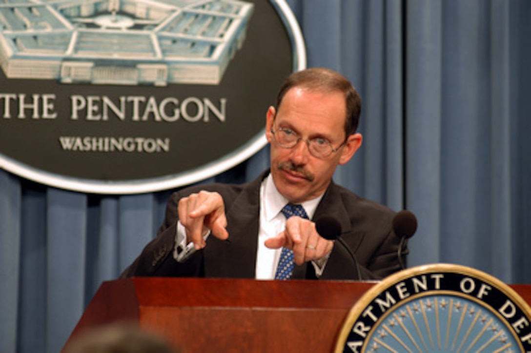Under Secretary of Defense (Comptroller) Dov Zakheim gestures to emphasize his point during a Pentagon press conference on April 16, 2003. Zakheim provided reporters an overview of the funding received from the fiscal 2003 budget supplemental and how the Department of Defense will utilize it. 