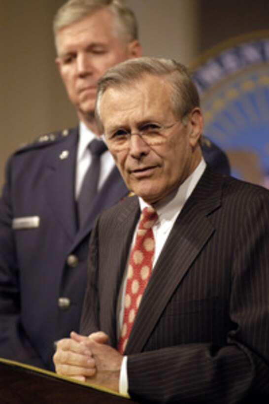 Secretary of Defense Donald H. Rumsfeld answers a question from the audience of military and Department of Defense civilian employees at a town hall style meeting in the Pentagon on April 17, 2003. Rumsfeld and Chairman of the Joint Chiefs of Staff Gen. Richard B. Myers, U.S. Air Force, thanked the Pentagon audience for their contribution to Operation Iraqi Freedom in their opening remarks and then took questions. 