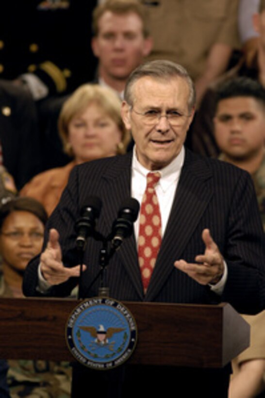 Secretary of Defense Donald H. Rumsfeld answers a question from the audience of military and Department of Defense civilian employees at a town hall style meeting in the Pentagon on April 17, 2003. Rumsfeld and Chairman of the Joint Chiefs of Staff Gen. Richard B. Myers, U.S. Air Force, thanked the Pentagon audience for their contribution to Operation Iraqi Freedom in their opening remarks and then took questions. 