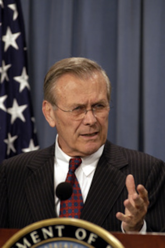 Secretary of Defense Donald H. Rumsfeld cautions reporters about the speculation surrounding air bases in Iraq during a Pentagon press briefing on April 21, 200, with Chairman of the Joint Chiefs of Staff Gen. Richard B. Myers. Rumsfeld told reporters that the U.S. is using four air bases in Iraq to bring in humanitarian assistance to help in the stability operations. 