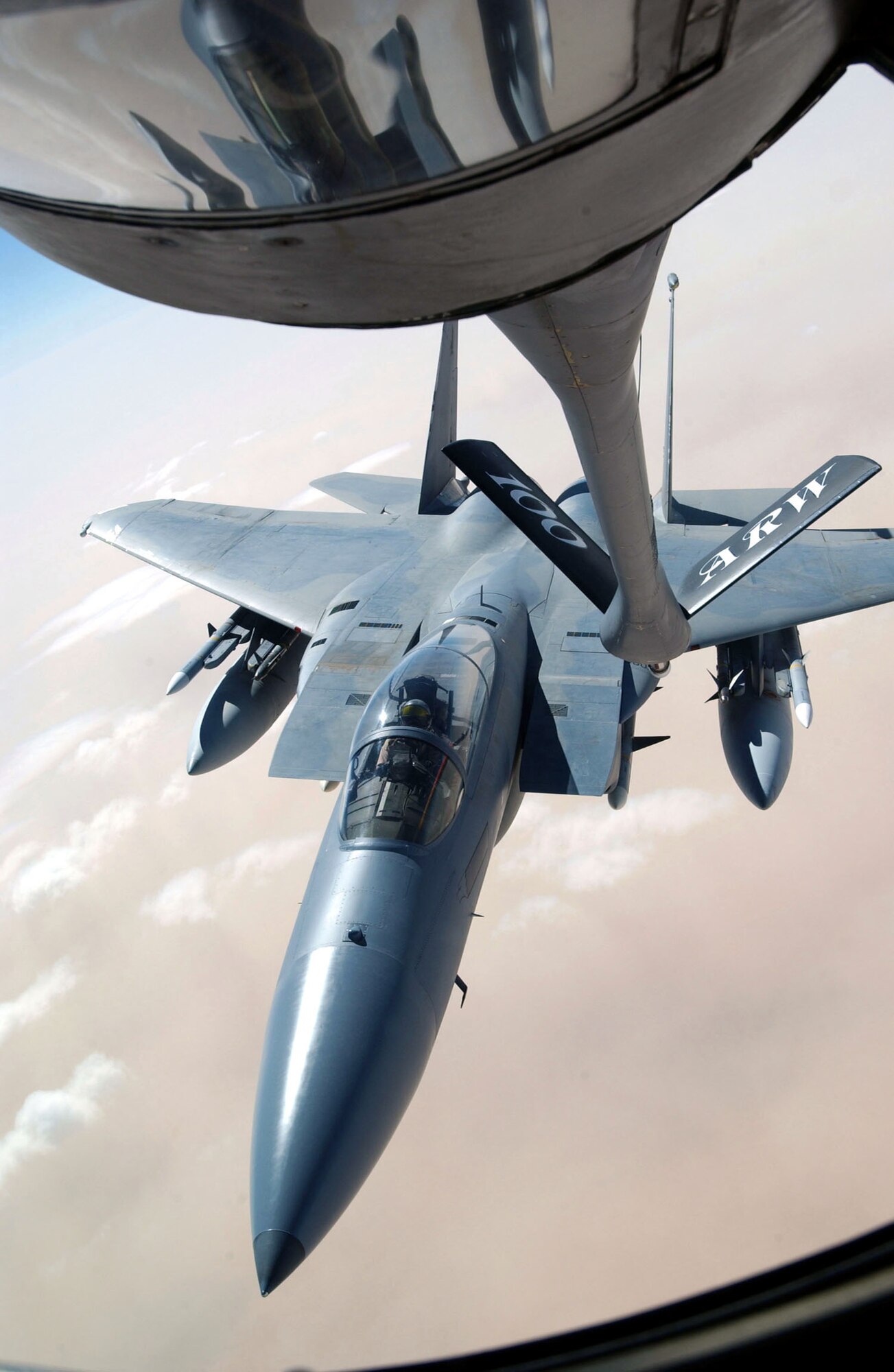 SOUTHWEST ASIA -- An F-15 Eagle from the 33rd Fighter Wing, Eglin Air Force Base, Fla., receives fuel from a tanker assigned to the 401st Air Expeditionary Wing, operating from a forward-deployed location. (U.S. Air Force photo by Master Sgt. Mark Bucher)                             