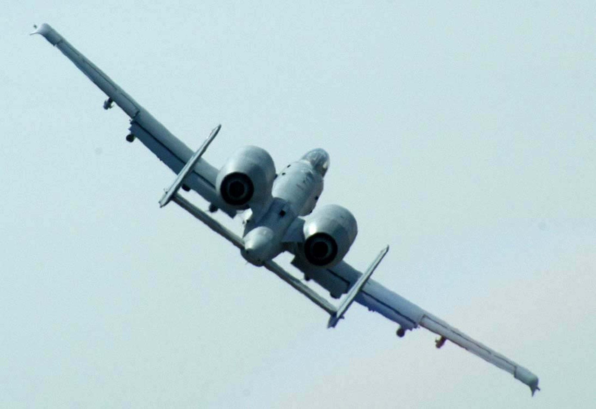 1990's -- BAGRAM AIR BASE, Afghanistan -- An A-10 Thunderbolt II assigned to the 104th Expeditionary Fighter Squadron banks to the right after take off. Coalition forces in Afghanistan launched another offensive, dubbed Operation Valiant Strike, on March 20, aimed at villages and cave complexes east of Kandahar in the Sami Ghar mountains, defense officials said. A-10 pilots provide close air support for Army forces here. (U.S. Air Force photo by Tech. Sgt. Adam Johnston)