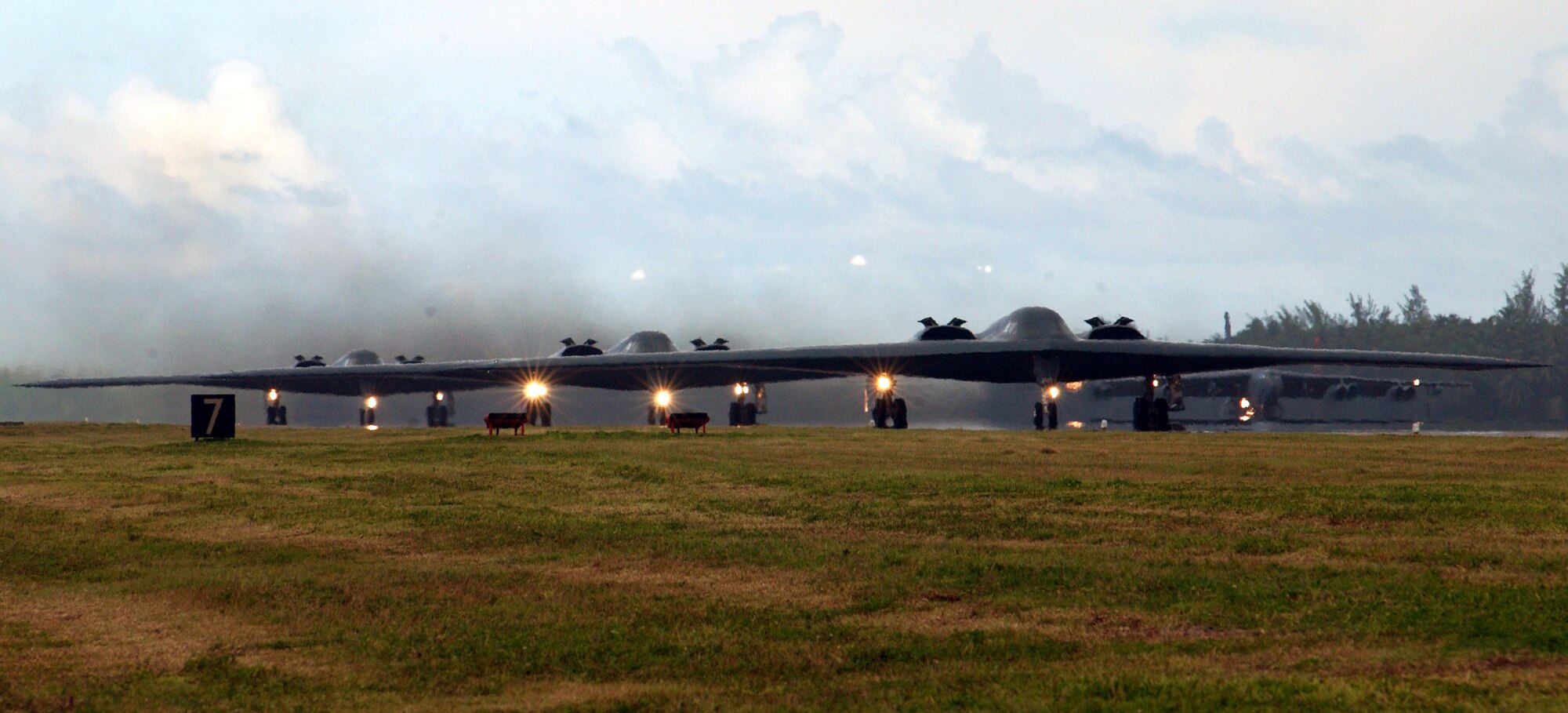 OPERATION IRAQI FREEDOM -- B-2 Spirit bombers taxi down the runway in preparation for the largest insertion of bombers since the Viet Nam conflict.  This flight will mark the official beginning of Operation Iraqi Freedom.  (U.S. Air Force photo by Tech. Sgt. Janice Cannon)